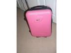 Pink hardshell 21 inch suitcase. Originally from....